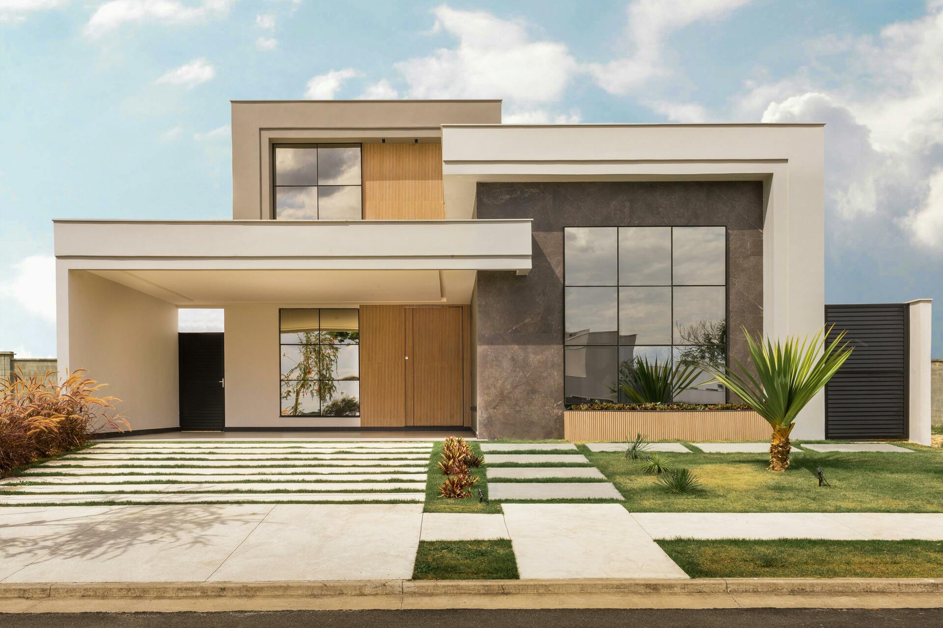 contemporary-house-exterior-with-minimalist-design-large-windows-and-landscaped-front-yard-PU6PMapBHzJncfdJwdEDiw